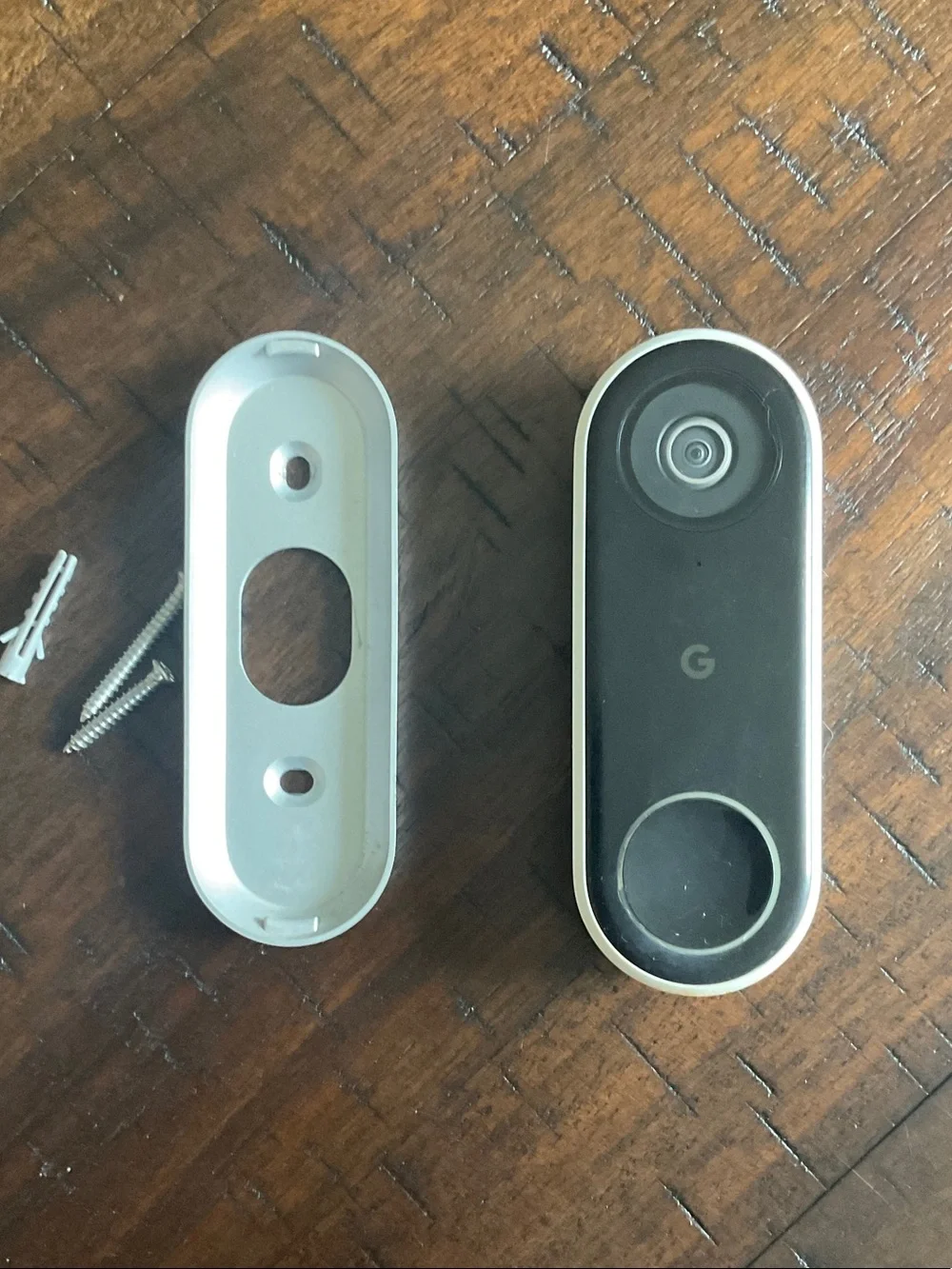 Google Nest Doorbell in black with white trim - compact wired webcam